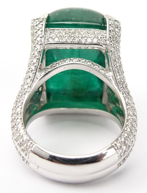 GIA Certified 25.59 Carat Sugarloaf Cabochon Emerald, Approx. 3.70 Carat Pave Set Diamond and 18 Karat White Gold Ring. 