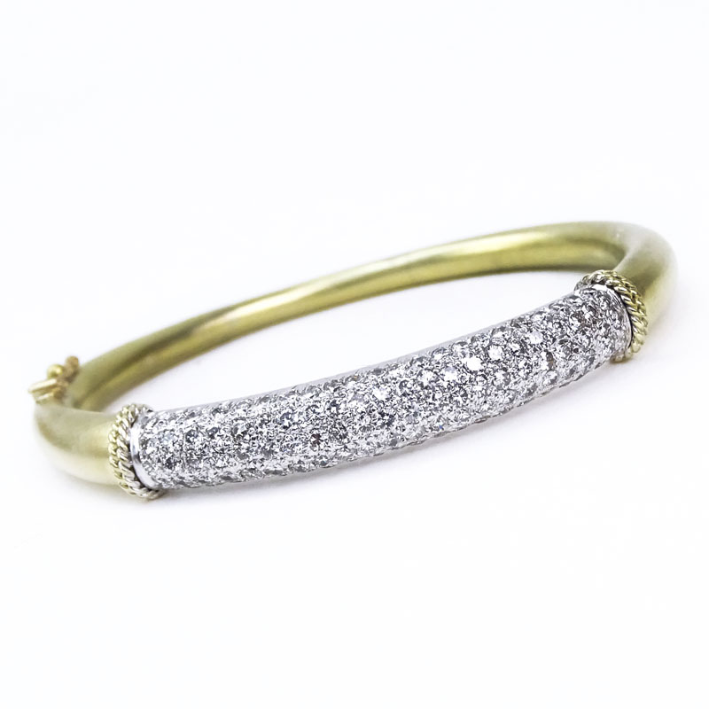 Approx. 3.30 Carat Pave Set Round Brilliant Cut Diamond and 14 Karat Yellow and White Gold Hinged Bangle Bracelet.