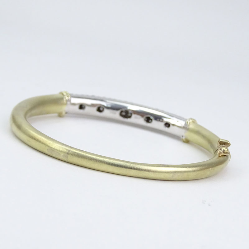 Approx. 3.30 Carat Pave Set Round Brilliant Cut Diamond and 14 Karat Yellow and White Gold Hinged Bangle Bracelet.