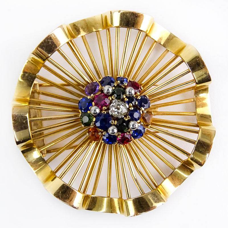 Retro 18 Karat Yellow Gold Pinwheel Brooch set with Approx. .50 Carat Old Mine Cut Diamond and Multi Color Gemstones.