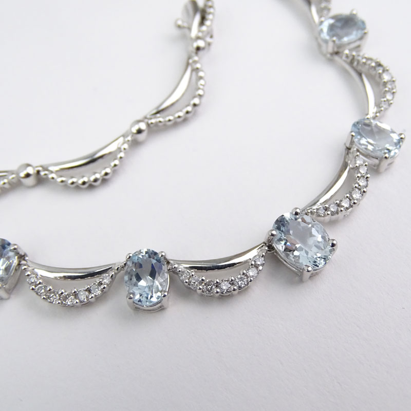 Approx. 5.0 Carat Oval Cut Aquamarine, 1.22 carat Round Brilliant Cut Diamond and 14 Karat White Gold Necklace. 