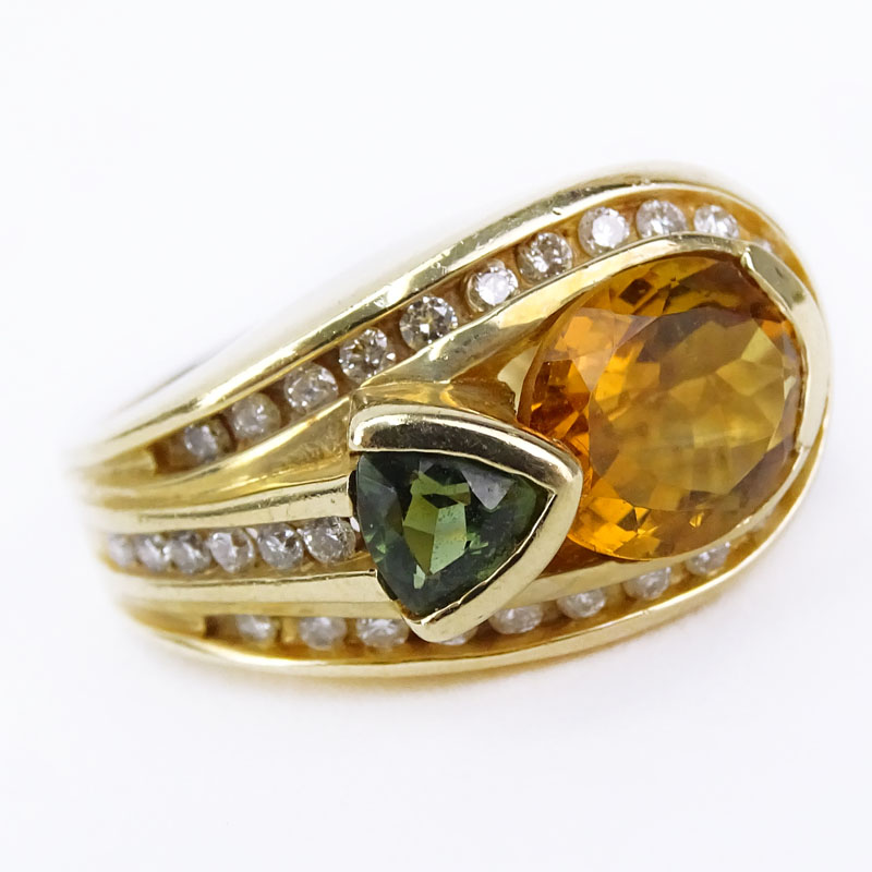 Vintage Oval Cut Citrine, Triangular Cut Green Tourmaline, Diamond and 14 Karat Yellow Gold Ring. 