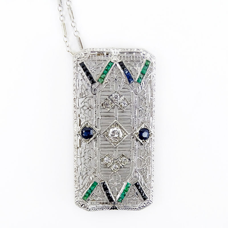 Art Deco Diamond, Sapphire, Emerald, Onyx and Platinum Filigree Bar Brooch Mounted as a Pendant with 14 Karat White Gold Chain.