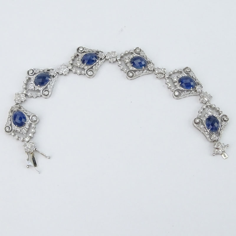 Approx. 30.0 Carat Oval Criss Cross Cut Sapphire, 5.0 Carat Round Brilliant Cut Diamond and 18 Karat White Gold Bracelet. 