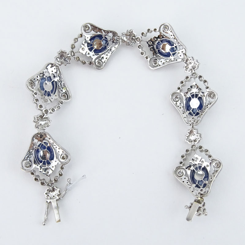 Approx. 30.0 Carat Oval Criss Cross Cut Sapphire, 5.0 Carat Round Brilliant Cut Diamond and 18 Karat White Gold Bracelet. 