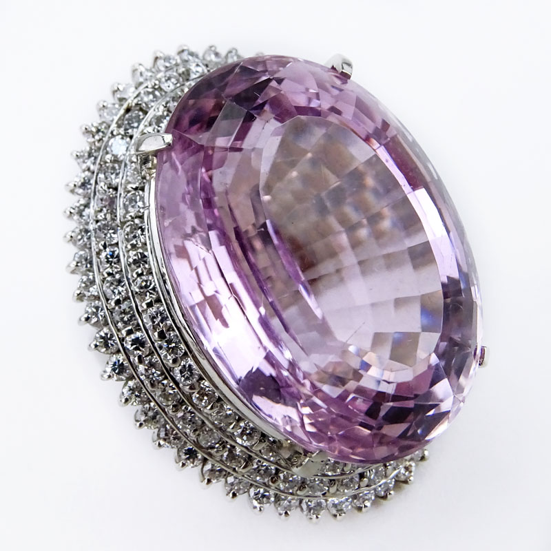 72.65 Carat Oval Cushion Cut Kunzite, 3.50 Carat Round Brilliant Cut Diamond and Platinum Ring.