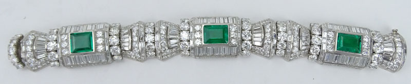 Spectacular French Art Deco Approx. 58.0 Carat Multi Cut Diamond, AGL Certified 12.0 Carat Rectangular Step Cut Colombian Emerald and Platinum Bracelet. 