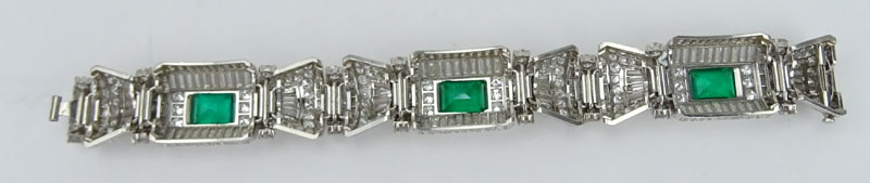 Spectacular French Art Deco Approx. 58.0 Carat Multi Cut Diamond, AGL Certified 12.0 Carat Rectangular Step Cut Colombian Emerald and Platinum Bracelet. 