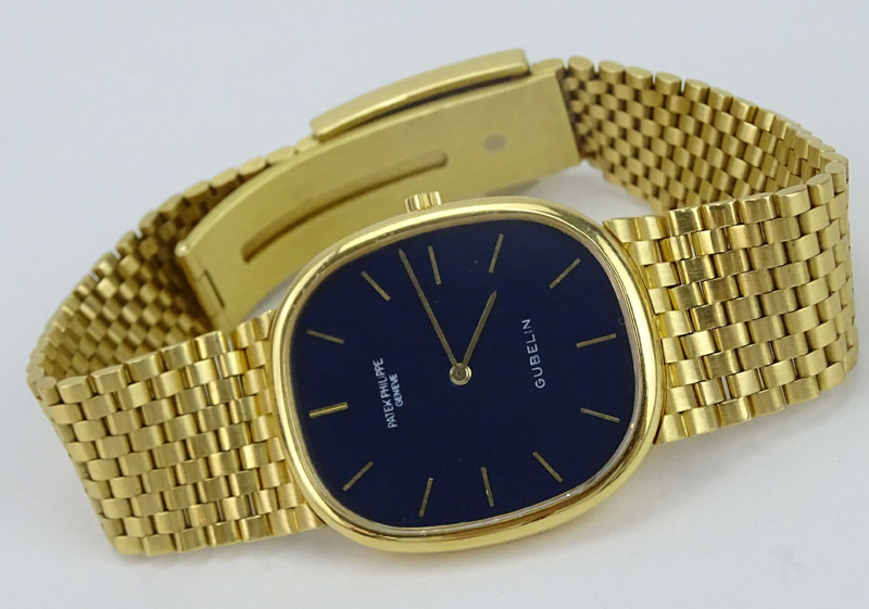 Man's Vintage Patek Philippe Gubelin Golden Ellipse 18 Karat Yellow Gold Bracelet Watch with Automatic Movement.