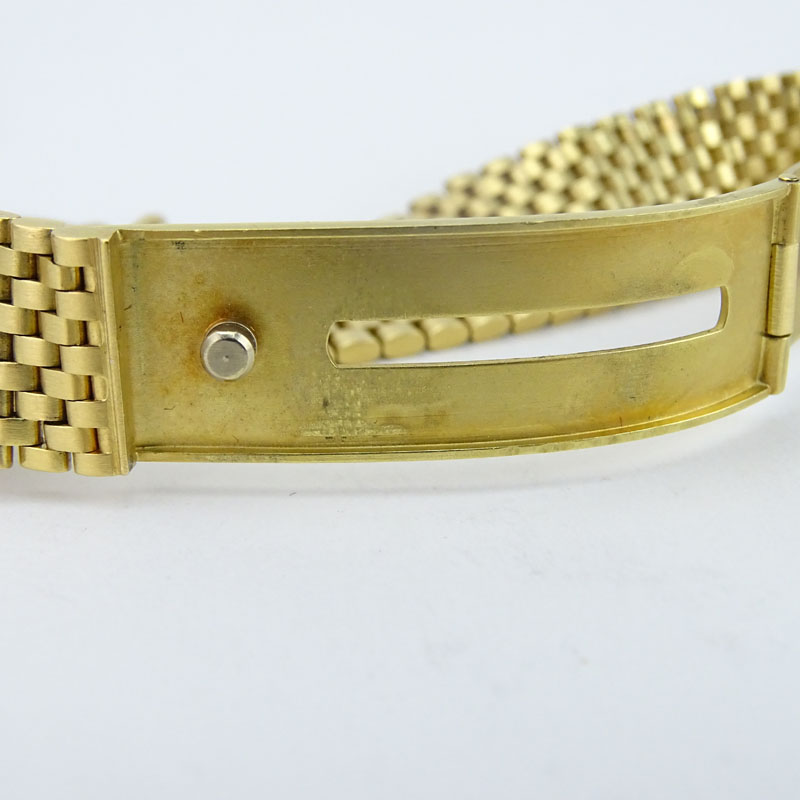 Man's Vintage Patek Philippe Gubelin Golden Ellipse 18 Karat Yellow Gold Bracelet Watch with Automatic Movement.