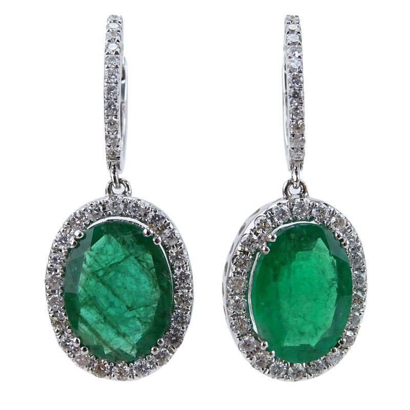 Approx. 5.45 Carat Oval Cut Emerald, 1.15 Carat Diamond and 18 Karat White Gold Pendant Earrings. 