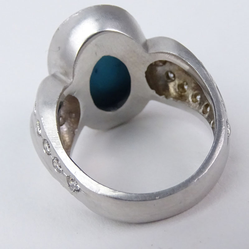 Vintage Persian Turquoise, .60 Carat Round Brilliant Cut Diamond and 18 Karat White Gold Ring. 