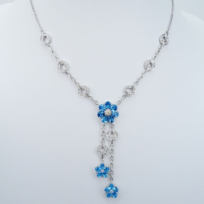 Oval Cut London Blue Topaz, Pave Set Diamond and 18 Karat White Gold Lariat style Necklace. 