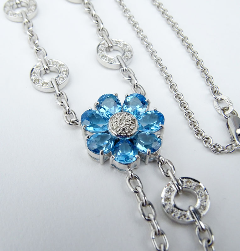 Oval Cut London Blue Topaz, Pave Set Diamond and 18 Karat White Gold Lariat style Necklace. 