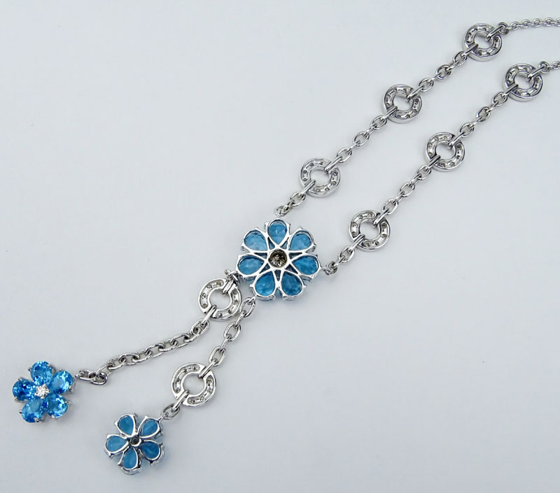 Oval Cut London Blue Topaz, Pave Set Diamond and 18 Karat White Gold Lariat style Necklace. 