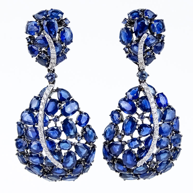 Approx. 30.0 Carat Oval Cut Sapphire, .50 Carat Round Brilliant Cut Diamond and 18 Karat White Gold Pendant Earrings. 