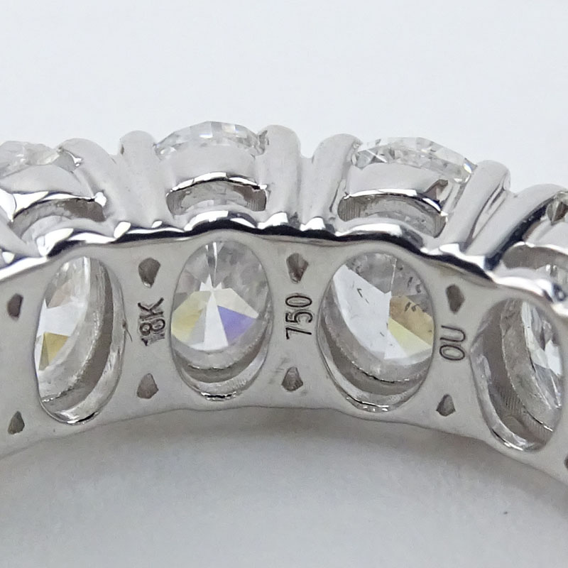 Approx. 9.50 Carat Oval Cut Diamond and 18 Karat White Gold Eternity Band.