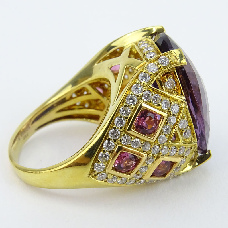 Large Criss Cross Oval Cut Amethyst, Pink Sapphire, Diamond and 18 Karat Yellow Gold Ring. 