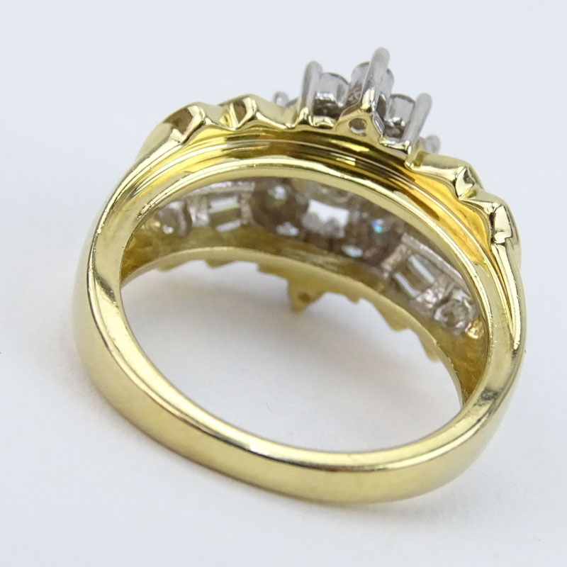 Approx. 1.75 Carat TW Marquise, Round Brilliant and Baguette Cut Diamond and 14 Karat yellow Gold Engagement Ring. 