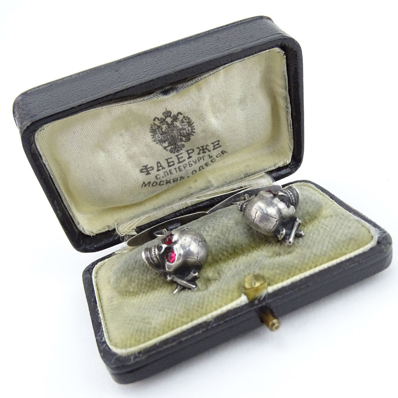 Antique Faberge 84 Silver and Enamel Figural Skull Cufflinks with Ruby Eyes and with Faberge Fitted Box.