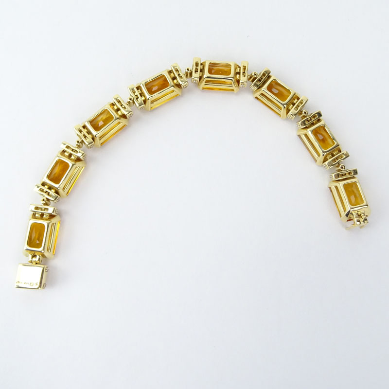 Fine Quality Eight (8) Golden Topaz, Diamond and 14 Karat Yellow Gold Bracelet. 