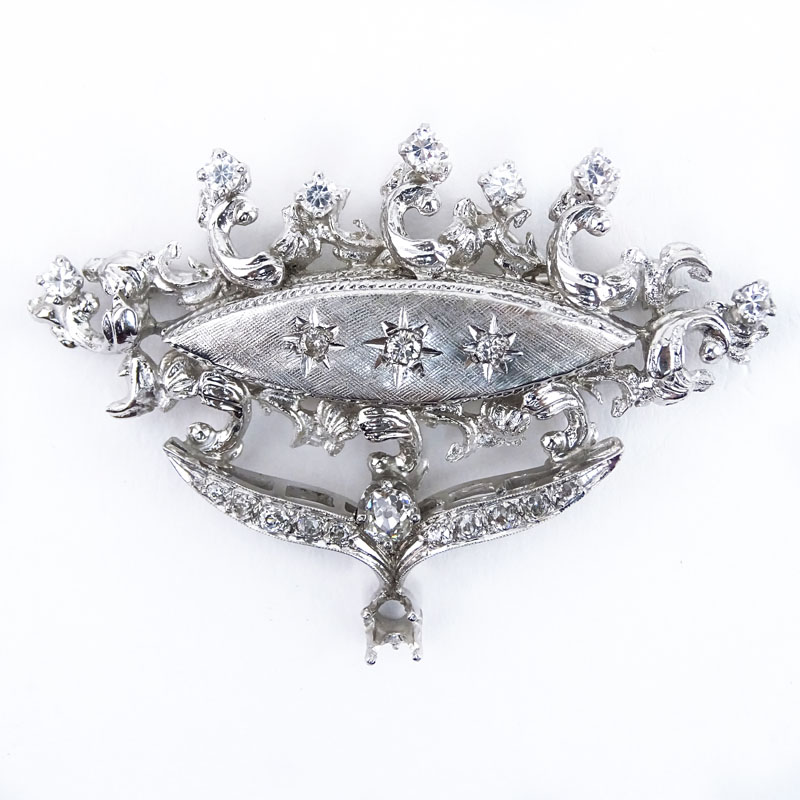 Vintage Round Brilliant Cut Diamond and 14 Karat White Gold Brooch.