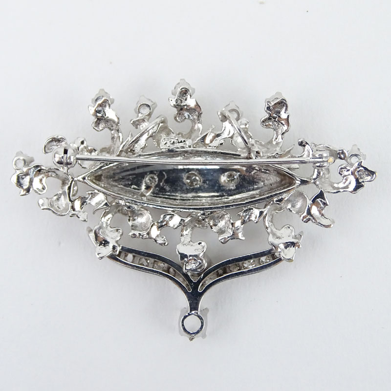 Vintage Round Brilliant Cut Diamond and 14 Karat White Gold Brooch.