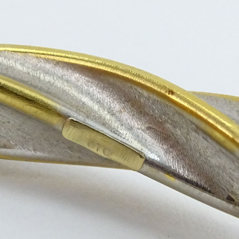 18 Karat Yellow and White Gold Hinged Bangle Bracelet and Artlinea 18 Karat Dome Ring.