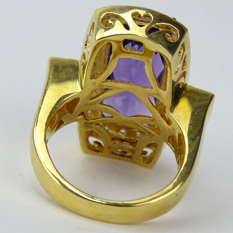 Rectangular Criss Cross Cut Amethyst, Diamond and 14 Karat Yellow Gold Ring. 