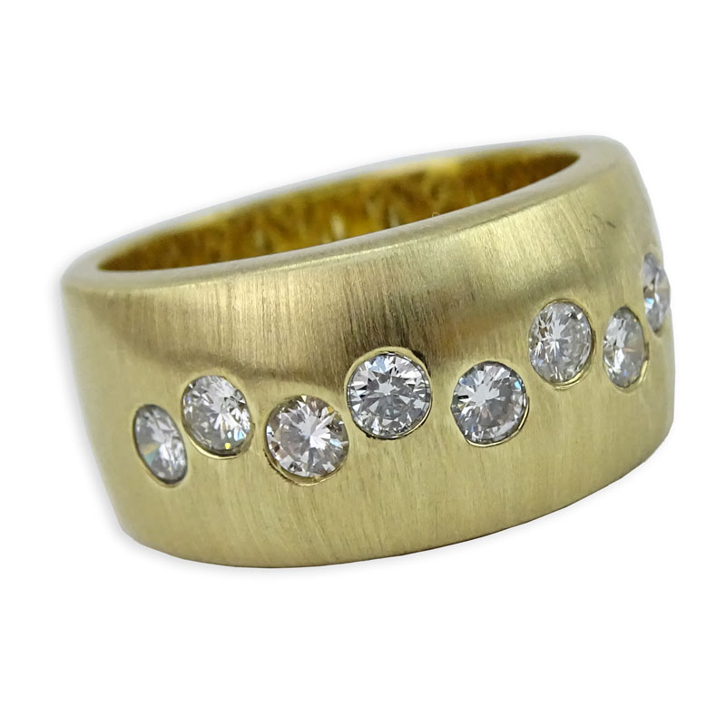 Approx. .80 Carat Round Brilliant Cut Diamond and 14 Karat Brushed Satin Yellow Gold Ring.