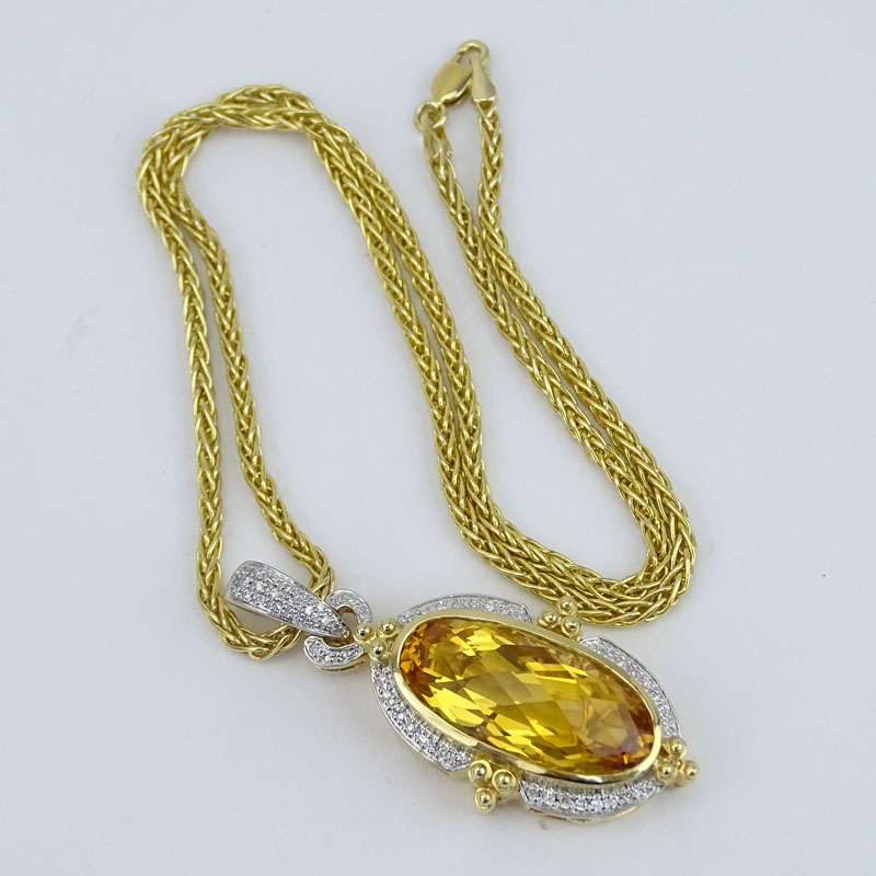 Criss Cross Citrine, Pave Set Diamond and 14 Karat Yellow Gold Pendant Necklace and Earring Suite. 