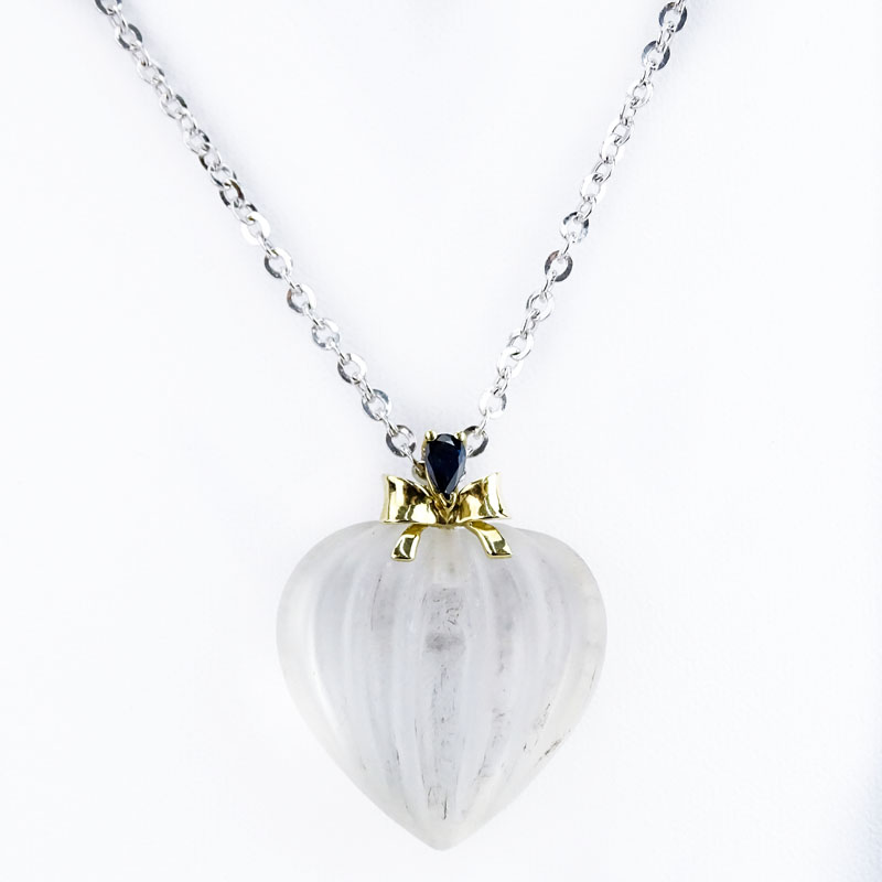 Vintage Crystal Heart Pendant Necklace with 14 Karat yellow Gold and Sapphire Accents to Pendant, 14 Karat White Gold Chain. 