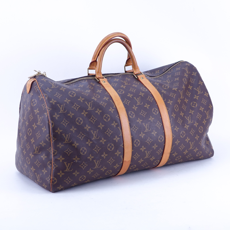 Louis Vuitton Monogram Keepall Duffel Bag With Luggage Tag. Canvas interior.