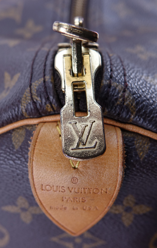 Louis Vuitton Monogram Keepall Duffel Bag With Luggage Tag. Canvas interior.