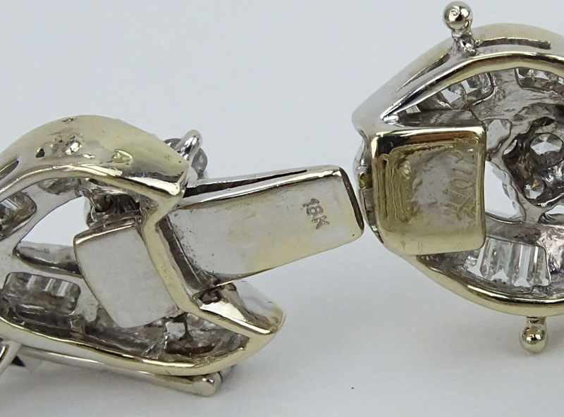 Approx.. 18.76 Carat (126) Round Brilliant and Baguette Cut Diamond and 18 Karat White Gold Bracelet.