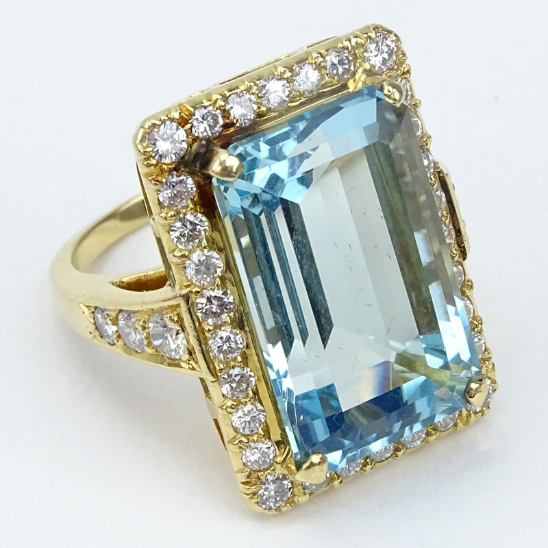 Vintage Approx. 20.0 Carat Emerald Cut Gem Quality Aquamarine, 2.0 Carat Round Brilliant Cut Diamond and 14 Karat Yellow Gold. 