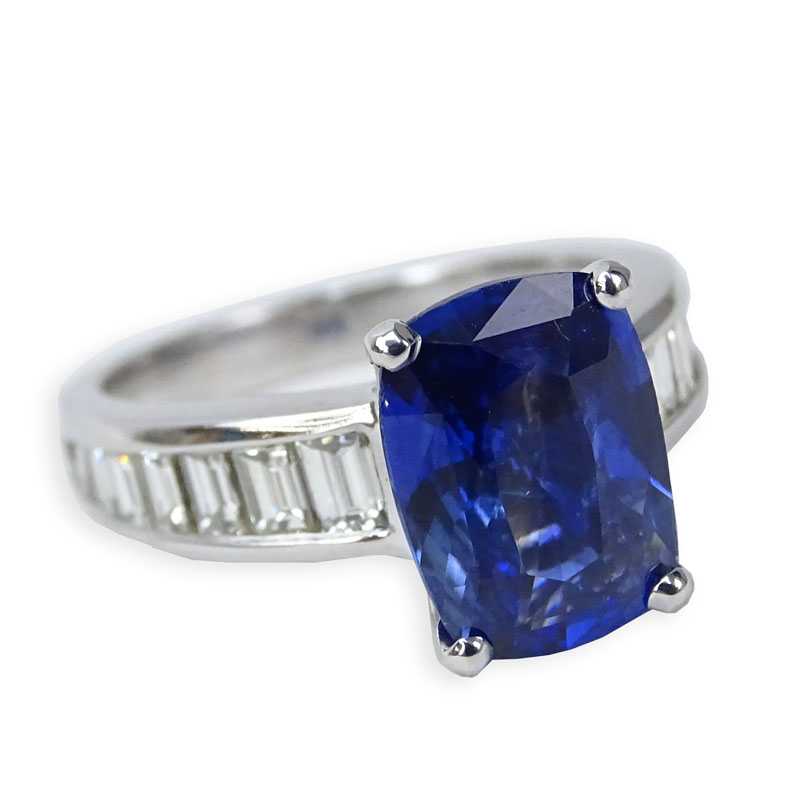 Approx. 3.47 Carat Cushion Cut Sapphire, .75 Carat Baguette Cut Diamond and 18 Karat White Gold Ring. 