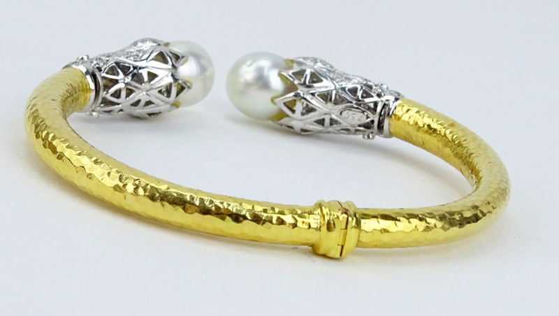 Vintage 18 Karat Yellow Gold, approx. 2.0 Carat Pave Set Diamond and South Sea Pearl Hammered Hinged Cuff Bangle. 