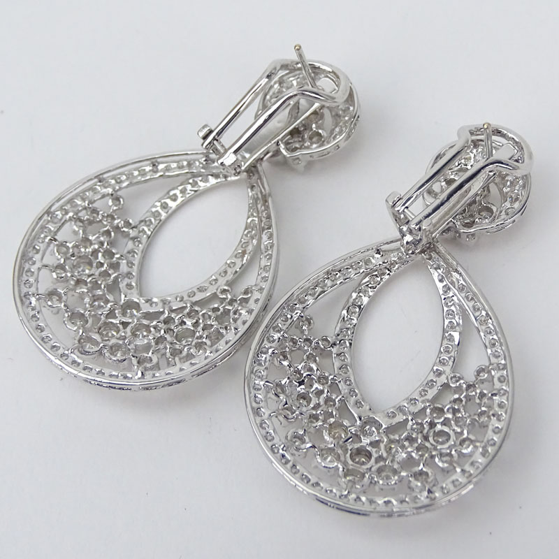 Van Cleef & Arpels Style Approx. 7.24 Carat Round Brilliant Cut Diamond and 18 Karat White Gold Chandelier Earrings.