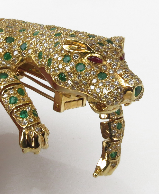 Large Vintage Cartier Style Articulated 18 Karat Yellow Gold Panther Bracelet / Brooch Accented throughout with Pave Set Diamonds and Emeralds and Ruby Eyes.