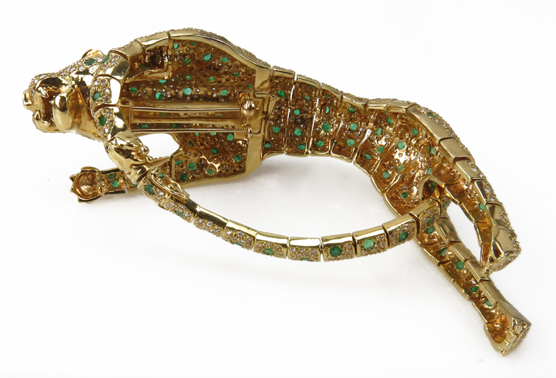 Large Vintage Cartier Style Articulated 18 Karat Yellow Gold Panther Bracelet / Brooch Accented throughout with Pave Set Diamonds and Emeralds and Ruby Eyes.