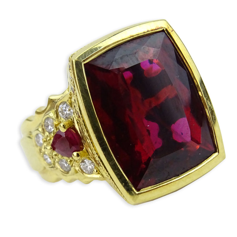 Large Cushion Cut Rubelite Tourmaline, Round Brilliant Cut Diamond and 18 Karat Yellow Gold Ring. 