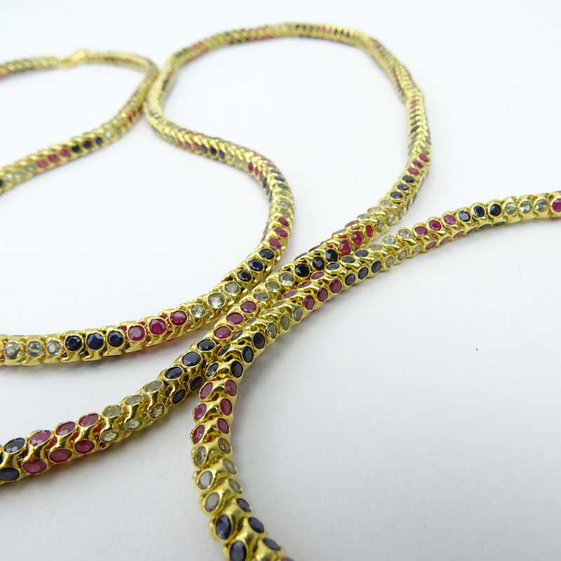 Vintage 18 Karat Yellow Gold Round Snake Link Necklace and Bracelet Suite Set throughout with Diamonds, Rubies and Sapphires. 