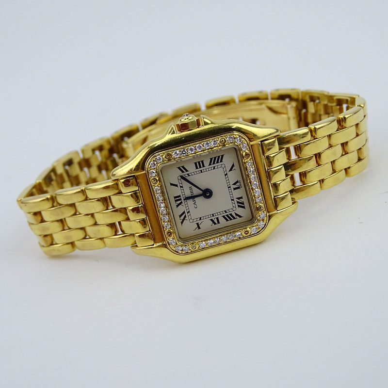 Lady's Cartier Panther 18 Karat Yellow Gold and Diamond Bracelet Watch with Swiss Quartz Movement .