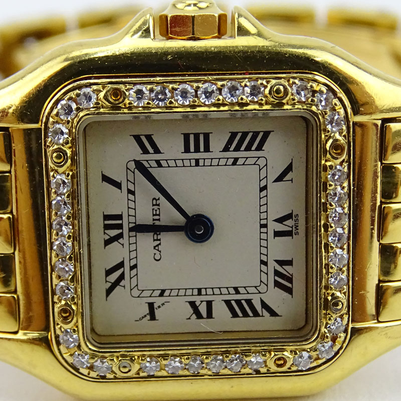 Lady's Cartier Panther 18 Karat Yellow Gold and Diamond Bracelet Watch with Swiss Quartz Movement .