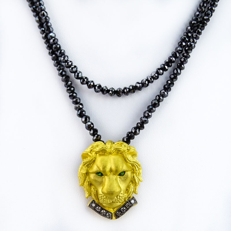 Vintage Black Diamond Bead Necklace(s) and Double Strand Bracelet Suite, the Necklace with 24 Karat Fine Gold Figural Lion Pendant accented with Fancy Yellow Diamonds and Emerald Eyes, the Bracelet with 24 Karat Yellow Gold and Diamond Charm.