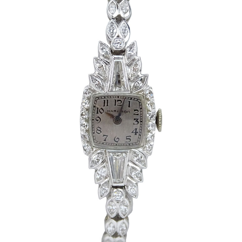 Lady's Vintage Approx. 4.0 Carat Tapered Baguette and Round Brilliant Cut Diamond and Platinum Hamilton Bracelet Watch with Manual Movement.