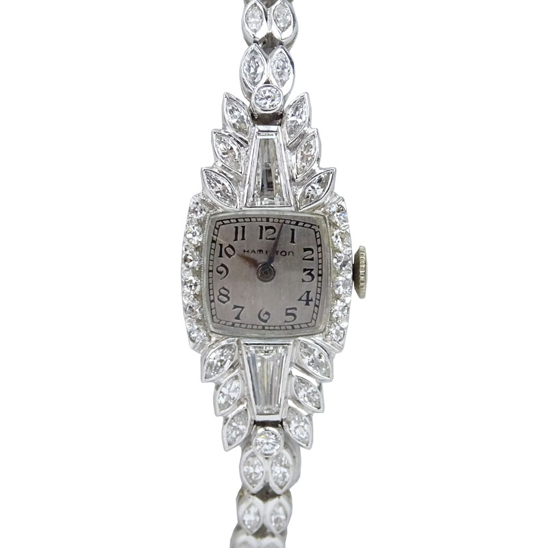 Lady's Vintage Approx. 4.0 Carat Tapered Baguette and Round Brilliant Cut Diamond and Platinum Hamilton Bracelet Watch with Manual Movement.