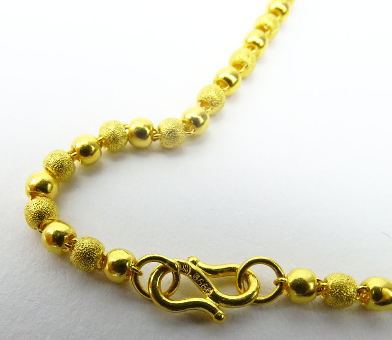 Vintage Long 24 Karat Pure Yellow Gold Graduated Bead Single Strand Necklace.