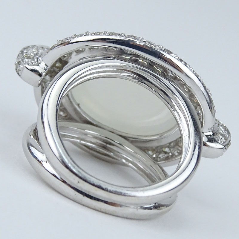 Large Oval Cabochon Moonstone, Pave Set Diamond and 18 Karat White Gold Ring. 